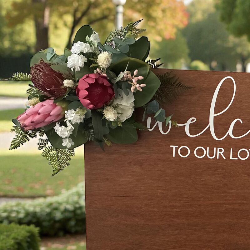 Arbour Flowers   Natives   Mix of pinks red and foliage 