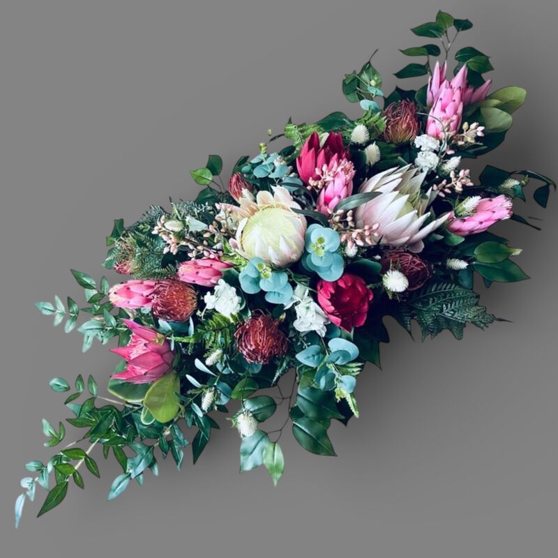 Arbour Flowers   Natives   red and pink native silk blooms with green foliage 