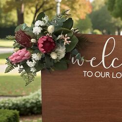 Arbour Flowers   Natives   Mix of pinks red and foliage 