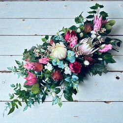 Arbour Flowers   Natives   Mix of pinks red and foliage 