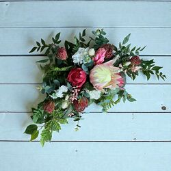 Arbour Flowers   Natives   Mix of pinks red and foliage 