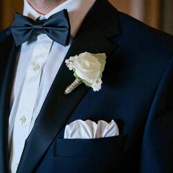 Boutonnire White with Green Leaf 